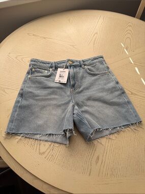 Ganni Faded Light Blue Frayed Denim Shorts
